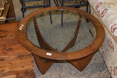 Lot 351 - A G-Plan circular glass top coffee table