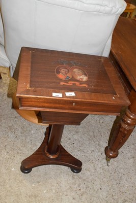 Lot 358 - A reproduction mahogany sewing table produced...