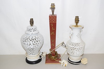 Lot 529 - A pair of pierced decoration lamp stands plus...