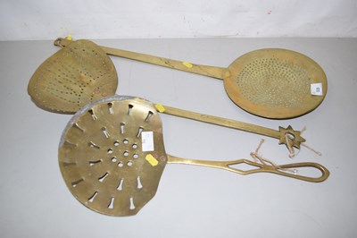 Lot 539 - Group of three brass dairy skimmers