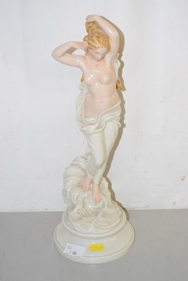 Lot 559 - A ceramic model of a lady