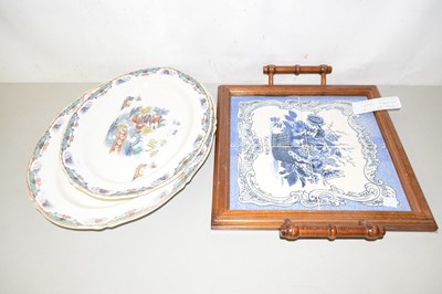 Lot 609 - A Portugese tile picture plus two large platters