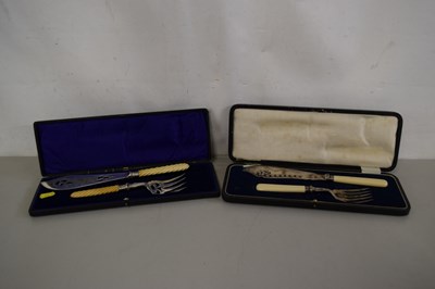 Lot 650 - Two pairs of cased fish servers