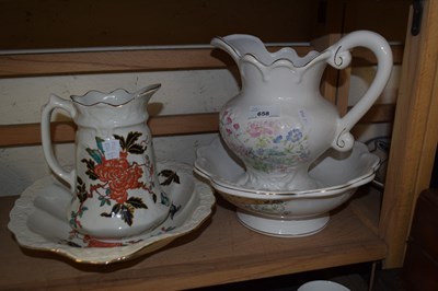 Lot 658 - A pair of water jugs and bowls