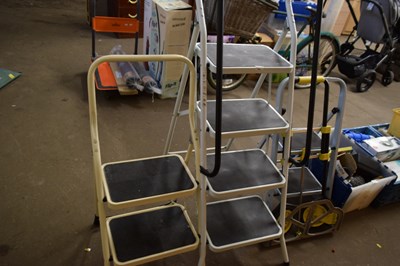 Lot 764 - Three stepladders and a folding trolley