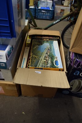 Lot 823 - Box of jigsaw puzzles - unchecked for...