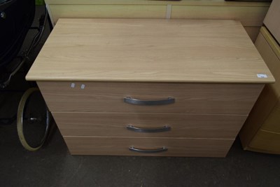 Lot 828 - A modern three drawer chest of drawers