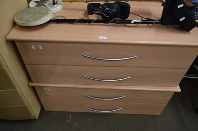 Lot 831 - A pair of two drawer chests of drawers