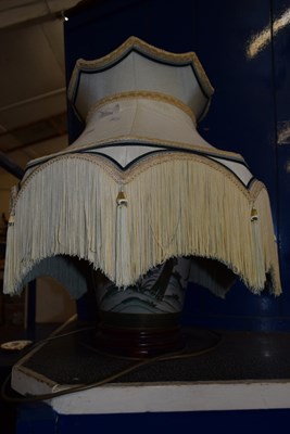 Lot 894 - A floral ceramic table lamp and shade