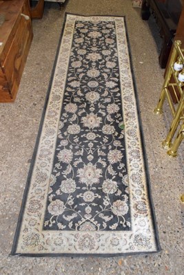 Lot 333 - A modern patterned floor runner carpet
