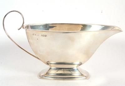 Lot 64 - An Elizabeth II silver sauce boat of plain...