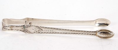 Lot 87 - A pair of Georgian silver bright cut decorated...
