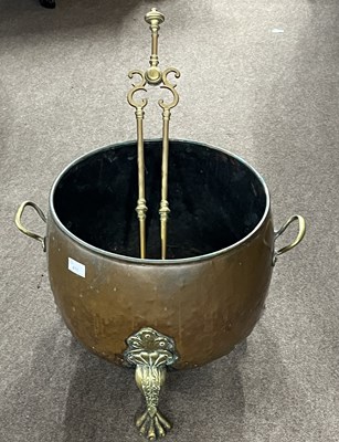Lot 411 - A copper and brass coal container with looped...