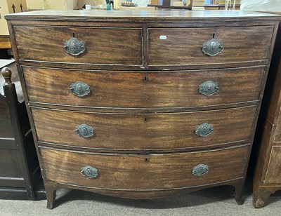 Lot 419 - A late Georgian mahogany bow front chest with...