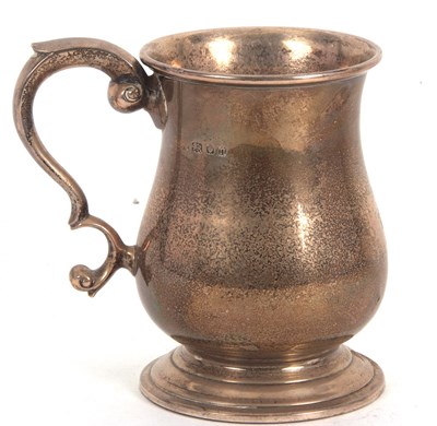 Lot 88 - A George V silver tankard of plain baluster...