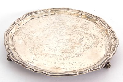 Lot 99 - A George V silver salver of circular form with...