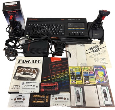 Lot 319 - A Sinclair ZX Spectrum + 2, together with...