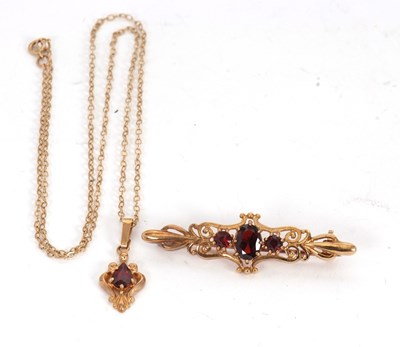 Lot 124 - A 9ct garnet brooch and necklace: the brooch...
