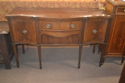 Lot 423 - A Georgian Revival mahogany serpentine front...