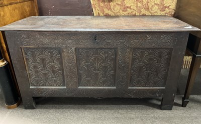 Lot 424 - An 18th Century oak coffer with two plank top...