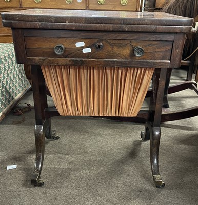 Lot 437 - A Victorian rosewood sewing table with hinged...