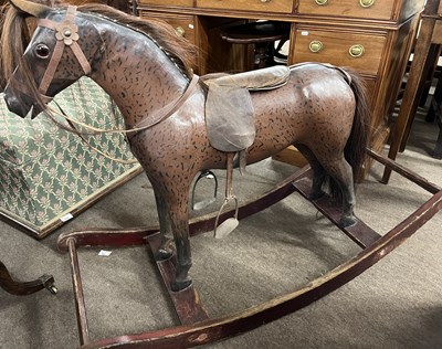 Lot 545 - A small 19th Century rocking horse, the body...