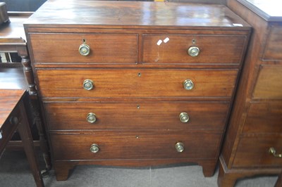 Lot 446 - A late Georgian mahogany chest of two short...