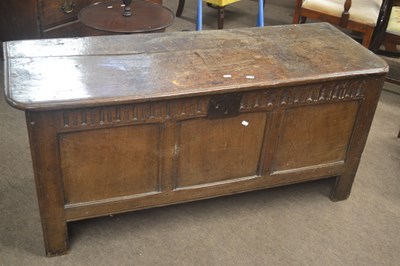 Lot 662 - A large 17th Century oak coffer with hinged...
