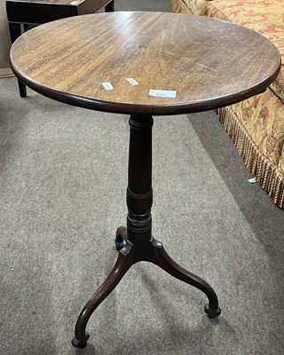 Lot 459 - A George III mahogany tilt top wine table...