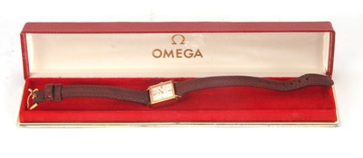Lot 215 - A square cased Omega Geneve ladies watch,...