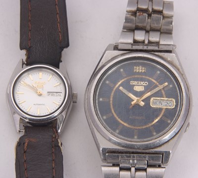 Lot 229 - Two Seiko 5 watches, one ladies and one gents,...