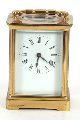 Lot 244 - A brass five glass carriage clock with key...