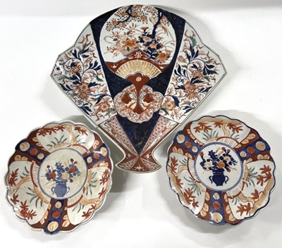 Lot 216 - A Japanese porcelain dish of fan shape...