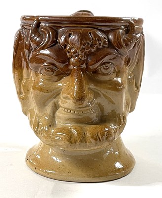 Lot 237 - A 19th Century salt glazed jug modelled as a...