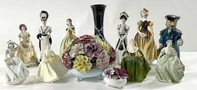 Lot 242 - Group of porcelain figurines including Royal...