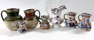 Lot 243 - A graduated set of Masons iron stone jugs...