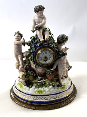 Lot 251 - A late 19th Century sevres style clock on oval...