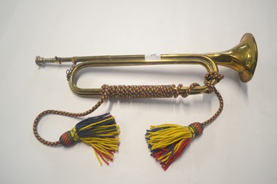 Lot 497 - British brass bugle with coloured military...
