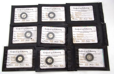 Lot 128 - A group of three 2gm proof 999 silver hand...