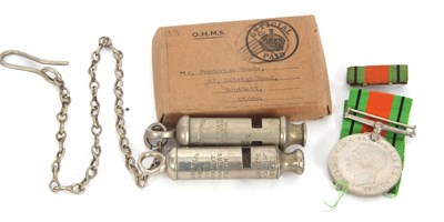 Lot 146 - Mixed Lot:  Two vintage whistles "The...