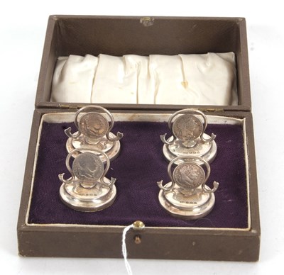 Lot 177 - A cased set of four George V menu/card holders,...