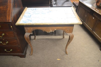 Lot 516 - An unusual continental side table, the top...