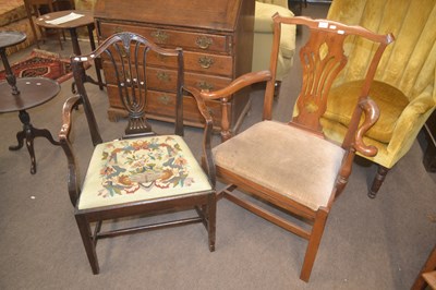 Lot 518 - A Georgian elm framed armchair with pierced...