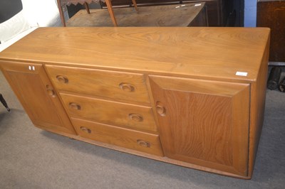 Lot 535 - An Ercol blonde elm low sideboard with two...