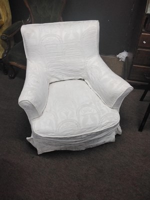 Lot 541 - A late Victorian low armchair with later cream...