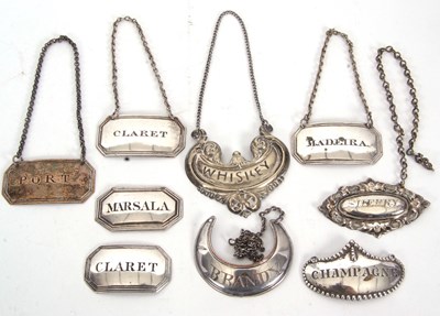 Lot 141 - A group of nine vintage metal spirit labels