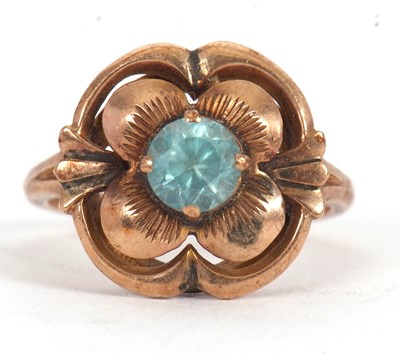 Lot 3 - A blue zircon dress ring, the central round...