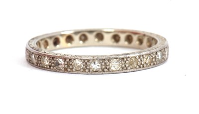 Lot 2 - A diamond eternity ring, the full hoop diamond...