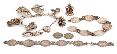 Lot 168 - A silver charm bracelet with padlock clasp...
