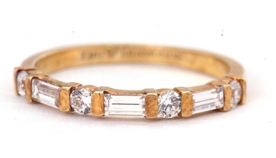 Lot 48 - A 'Tru Diamonds' half eternity ring, in gilt...